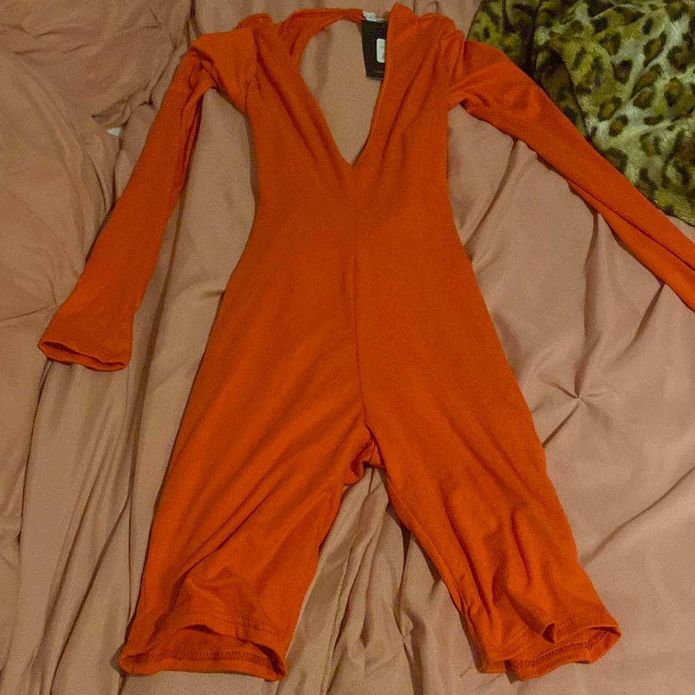 Fashion nova never worn romper with the back out